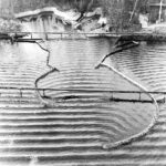 Groot onderhoud aan schaalmodel haven IJmuiden in Waterloopbos